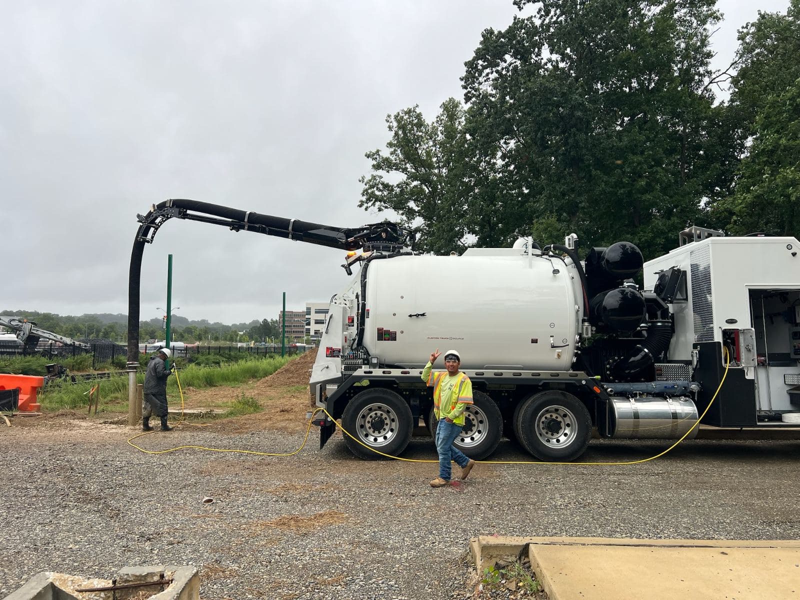 SRVacJet hydrovac crew exposing utilities on a job site